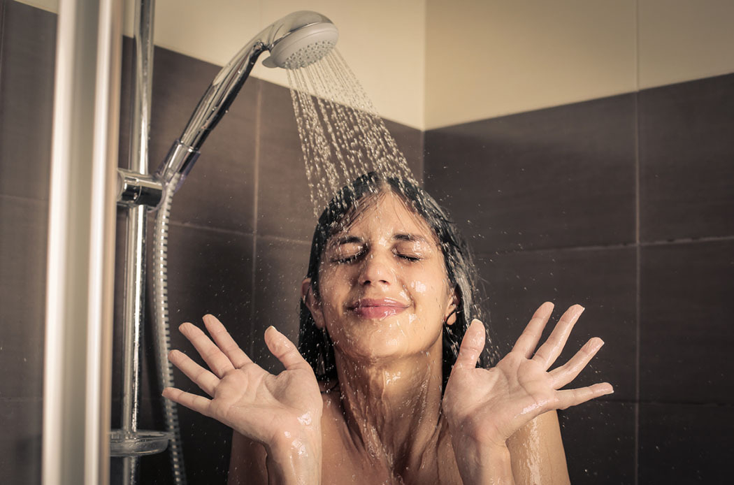 Woman in cold shower