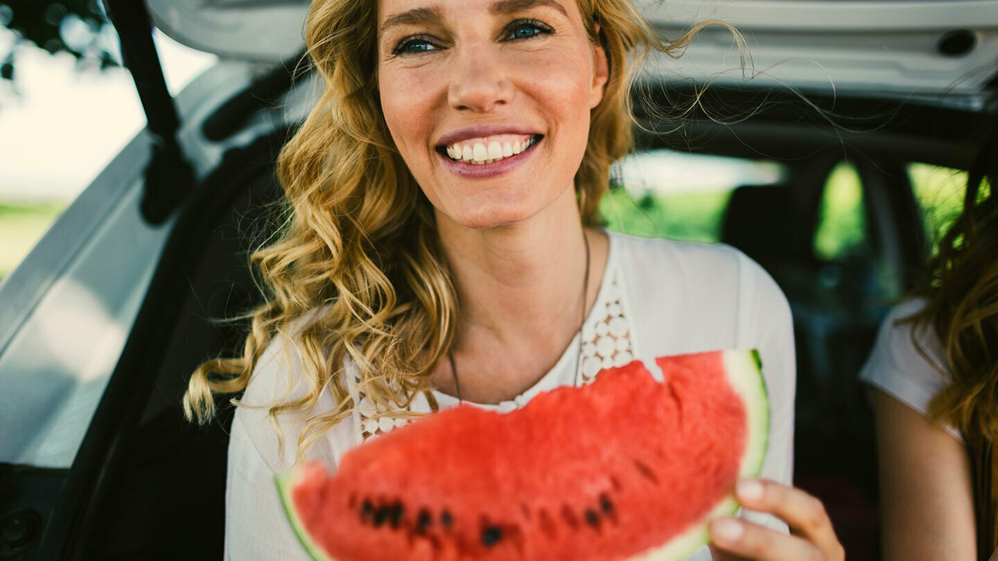 Woman eating watermelon